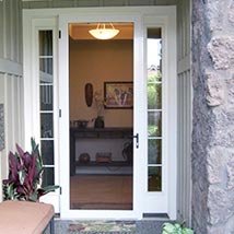 white-framed double door with a retractable screen